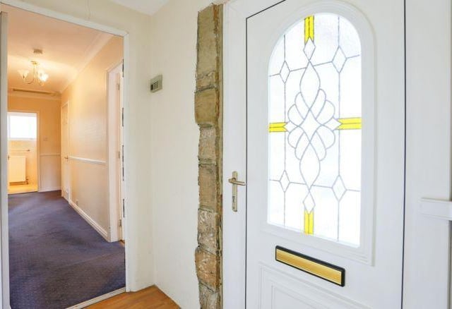 Enter into the detached bungalow and into a spacious hallway which has the stairs that lead to the first floor.