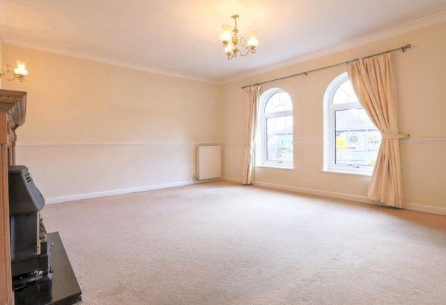 The living room is to the front of the property and has oodles of space.