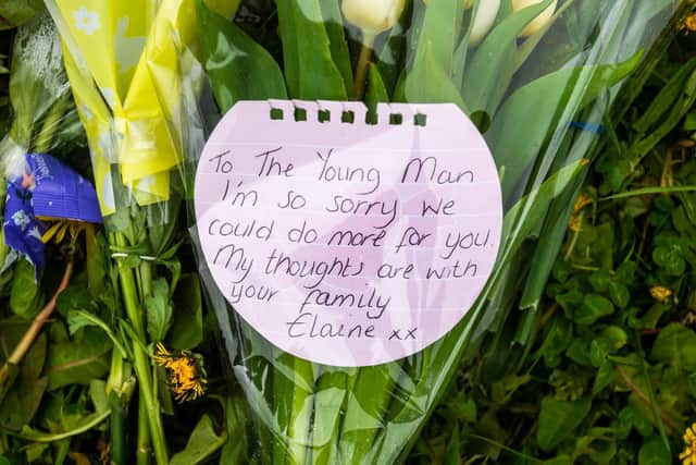 Floral tributes have been left at the scene.