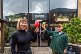 The Water Lane Boathhouse, Canal Wharf, Holbeck, Leeds, is celebrating it's 5th birthday this weekend. Pictured Cait Hopkinson, Assistant Manager of The Water Lane Boathhouse, raising the glass alongside...Hugo Monypenny, founder of award winning independent street food venture Mormor, who will be trading at the event. Photo: James Hardisty