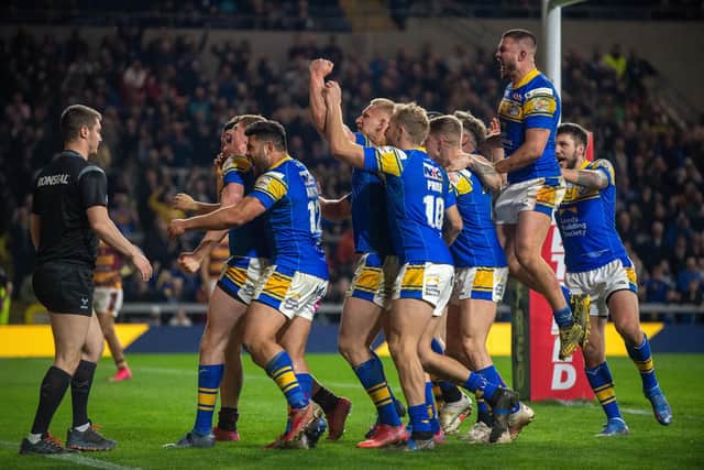Rhinos celebrate the try by Morgan Gannon which they thought had won the game against Giants. Picture by Bruce Rollinson.