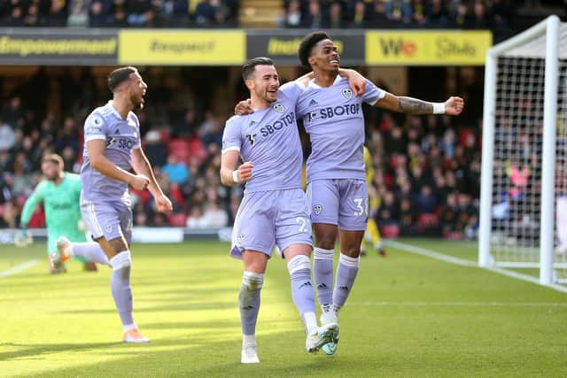 Sam Greenwood celebrates Leeds United's third goal against Watford with Jack Harrison and Crysencio Summerville. Pic: Alex Morton.