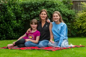 Tina Pinder and her daughters, Gracie, 13, and Lola, nine, will take on the March for Men in memory of Lloyd