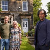 A house which featured in A House Through Time is on the market. Pictured are owners Jackie and Pete Slater with TV host David Olusoga.