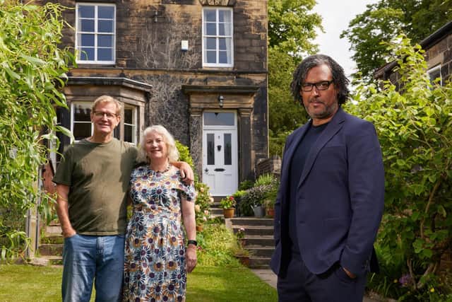 A house which featured in A House Through Time is on the market. Pictured are owners Jackie and Pete Slater with TV host David Olusoga.