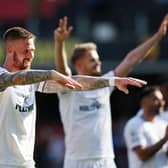 MATCH-WINNER: Pontus Jansson, left, celebrates after his 95th-minute header gave Brentford a 2-1 victory at Watford.
Photo by Matthew Lewis/Getty Images.