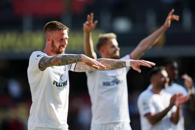 MATCH-WINNER: Pontus Jansson, left, celebrates after his 95th-minute header gave Brentford a 2-1 victory at Watford.
Photo by Matthew Lewis/Getty Images.
