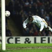 AT THE DOUBLE: Jimmy Floyd Hasselbaink heads home to complete a brace and net Leeds United's third goal en route to beating Chelsea at Elland Road back in April 1998. Picture by Mark Bickerdike.
