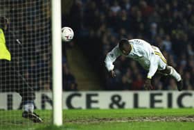 AT THE DOUBLE: Jimmy Floyd Hasselbaink heads home to complete a brace and net Leeds United's third goal en route to beating Chelsea at Elland Road back in April 1998. Picture by Mark Bickerdike.