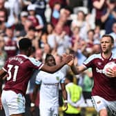 CLAWING BACK THE CLARETS: Goalscorer Tomas Soucek, right, and Ben Johnson, let, celebrate putting West Ham United level at 1-1 in Sunday's Premier League clash against Burnley at the London Stadium. Photo by JUSTIN TALLIS/AFP via Getty Images.