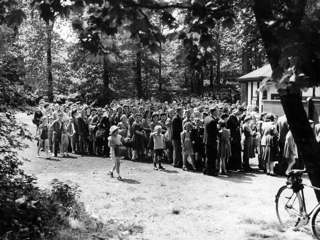 A huge crowd of people queuing for the bathing pool on Whit Monday in 1944. As a bank holiday it was an opportunity for families to get out and enjoy themselves away from the troubles of wartime.