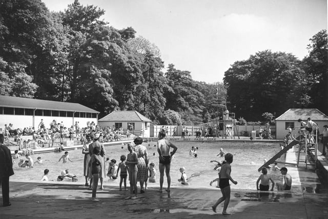 A busy swimming pool in June 1953.