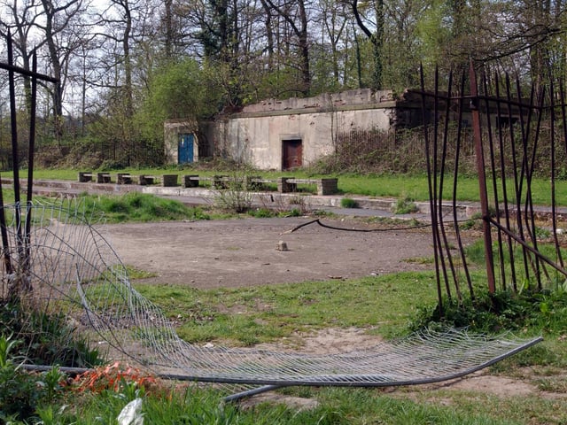 The derelict remains of  the former outdoor swimming pool in April 2003.