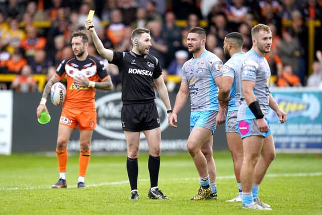 Rhinos' James Bentley is shown a yellow card by referee Liam Moore in Monday's defeat at Castleford. Picture by Danny Lawson/PA.