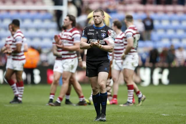 Wakefield Trinity forward James Batchelor cuts a dejected figure after his side's 54-10 Super League defeat at Wigan Warriors. Picture: Ed Sykes/SWpix.com.