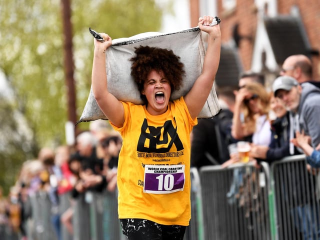 The race, which attracted hundreds of spectators, saw runners start from the Royal Oak pub to the Maypole Green in the village centre.