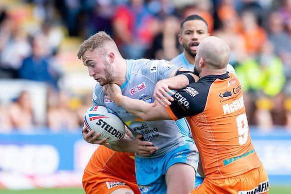 Rhinos' Jarrod O'Connor is tackled by Tigers captain Paul McShane. Picture by Allan McKenzie/SWpix.com.