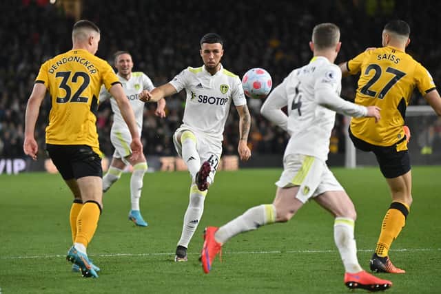 STEPPING FORWARD: Leeds United's Sam Greenwood, centre, who bagged his first Whites assist in just his fifth outing for the first team in last month's Premier League clash at Wolves, above. Picture by Bruce Rollinson.