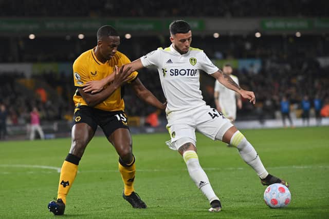 SHINING EXAMPLE: Twenty-year-old Leeds United forward Sam Greenwod, right, holds off Willy Boly in last month's epic victory against Wolves at Molineux.
Picture by Bruce Rollinson.