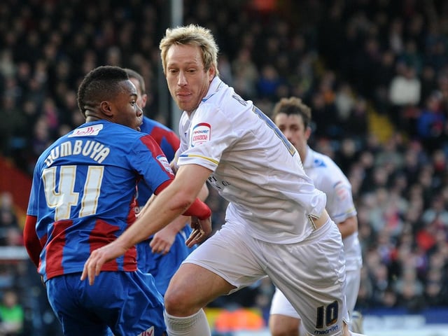 Luciano Becchio gets past Mustapha Dumbuya.