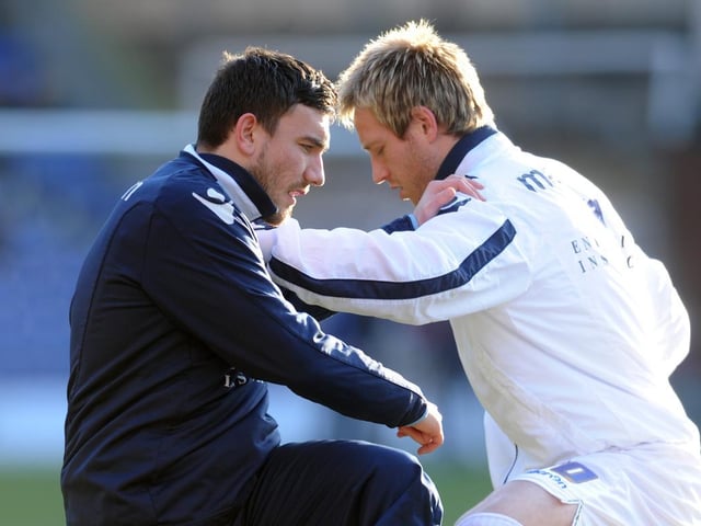Robert Snodgrass and Luciano Becchio warm up before kick-off.