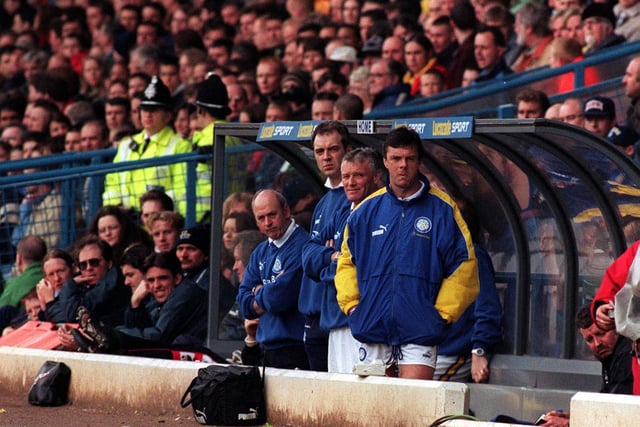 The Leeds United dug out watches pensively.