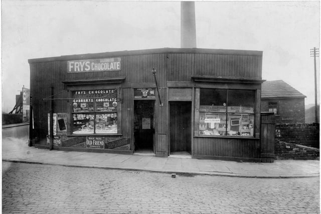 Shops on Botany Bay Place at the junction of Canal Road in April 1923. The premises on the right is Charles Coakley hairdresser and on the left is Moran Valentine Confectioners.
