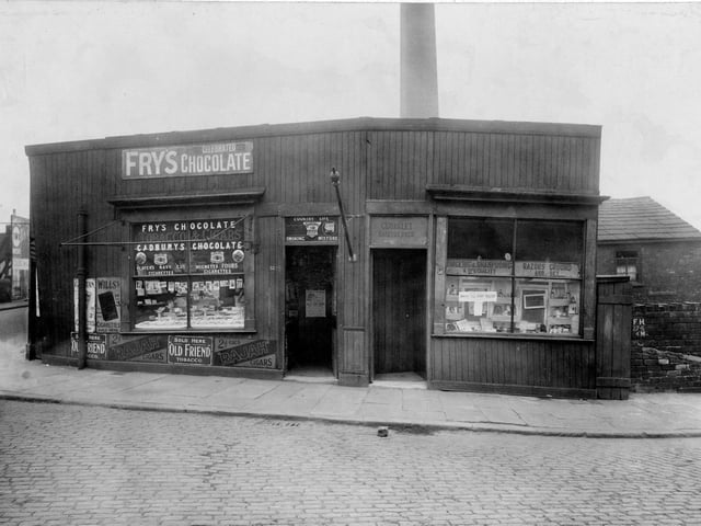 Shops on Botany Bay Place at the junction of Canal Road in April 1923. The premises on the right is Charles Coakley hairdresser and on the left is Moran Valentine Confectioners.
