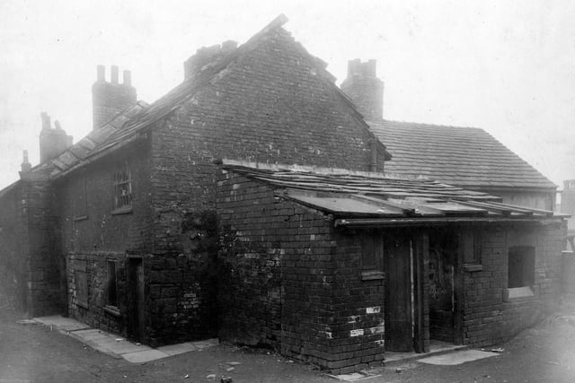 Lupton Fold in April 1928. Located between Carr Crofts and Station Road, row of empty cottages and outside toilets.
