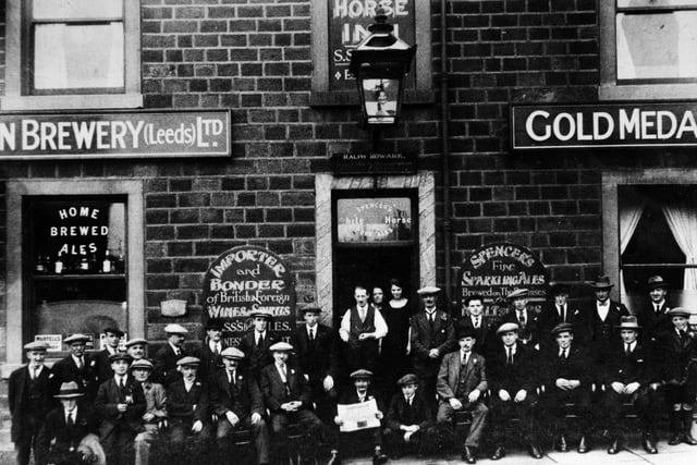 Regulars outside the The White Horse circa 1920.