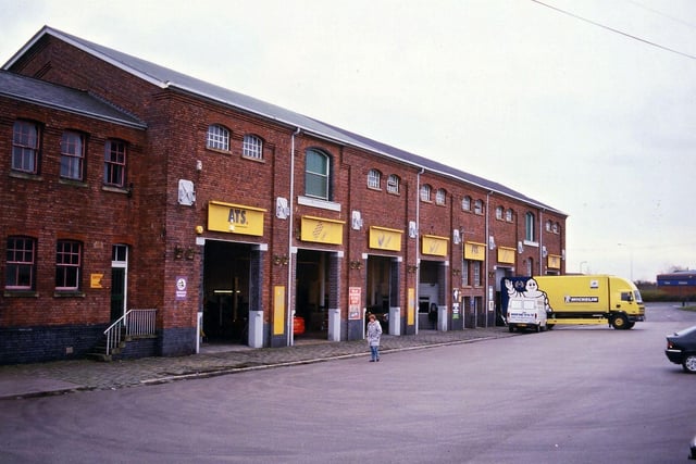 ATS Ltd on Chartists Way in Morley pictured in November 1998. By the year 2000 this building was the only part of the Great Northern Railway complex still standing in the area where Morley Top Station had been. It had been a warehouse where goods could be unloaded from railway trucks under cover close to the edge of the railway goods yard.
