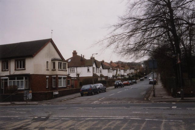 Looking up Churchwood Avenue from the junction with Otley Road. To the right of the road are the Headingley Water Treatment Works, the site of which has since been redeveloped as housing.