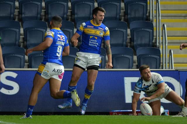 Highs and lows: Tom Briscoe scored Leeds' third try - but later went off with an ankle injury.
Picture Bruce Rollinson