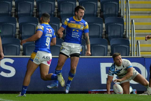 Highs and lows: Tom Briscoe scored Leeds' third try - but later went off with an ankle injury. 
Picture Bruce Rollinson