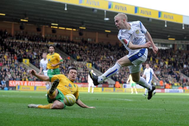 Leeds United attacker Mike Grella's shot is blocked by Norwich City's Russel Martin in March 2010. Pic: Tony Johnson.