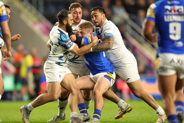 Leeds Rhinos' Jarrod O'Connor is tackled by the Toulouse defence. Picture: John Clifton/SWpix.com.