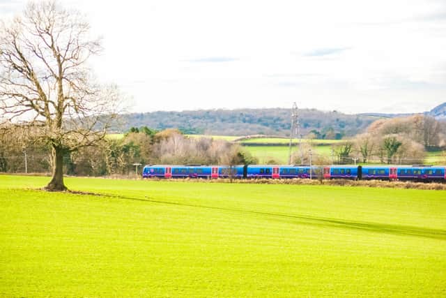 TRAIN TRAVEL: TransPennine Express in countryside. (Adobe)