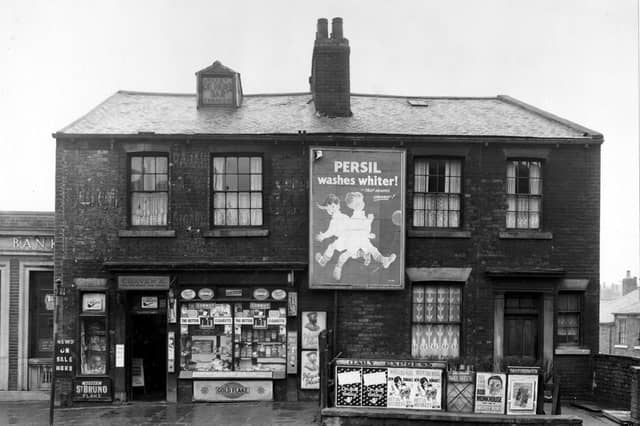Burley Road in March 1956. The main focus of the photos is a newsagents with Leeds, Skyrack and Morley Savings Bank on the left.