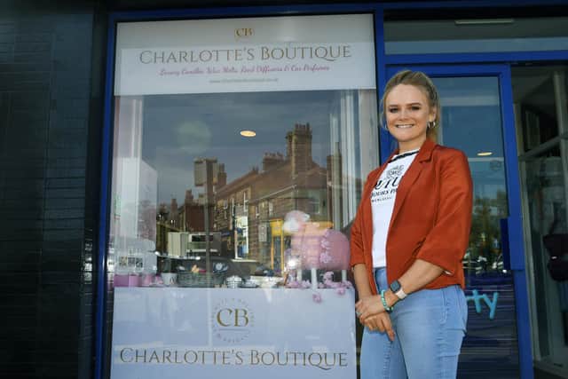 A Leeds mum who started making candles on her kitchen table has opened her first boutique, after her business boomed during lockdown.