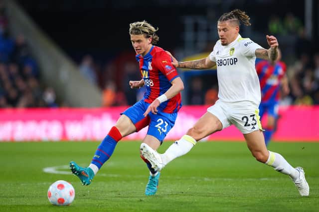 Crystal Palace midfielder Conor Gallagher holds off a challenge by Leeds United midfielder Kalvin Phillips. Pic: Craig Mercer.