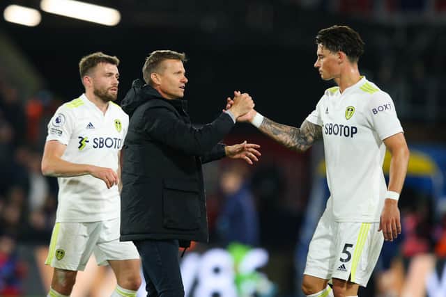 Leeds United boss Jesse Marsch greets Robin Koch after the Whites' 0-0 draw with Crystal Palace. Pic: Craig Mercer.