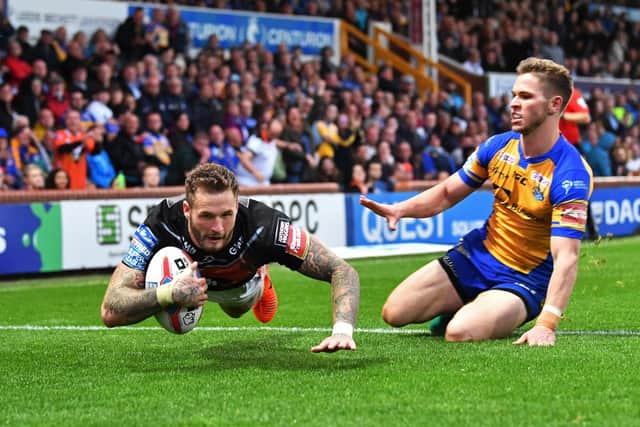 Matt Parcell can't prevent Zak Hardaker scoring for Castleford against Leeds at Headingley in 2017. Picture by Bruce Rollinson.