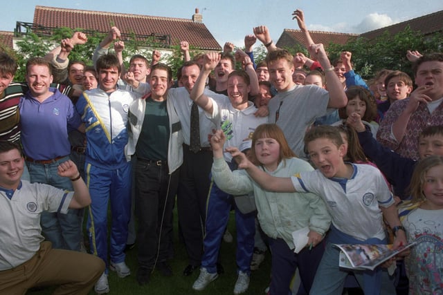 Lee Chapman, David Batty, Gary McAllister and Gary Speed celebrate the Whites' title with fans in Chapman's garden.