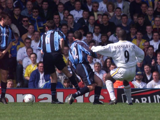 Striker Jimmy Floyd Hasselbaink fires towards goal.