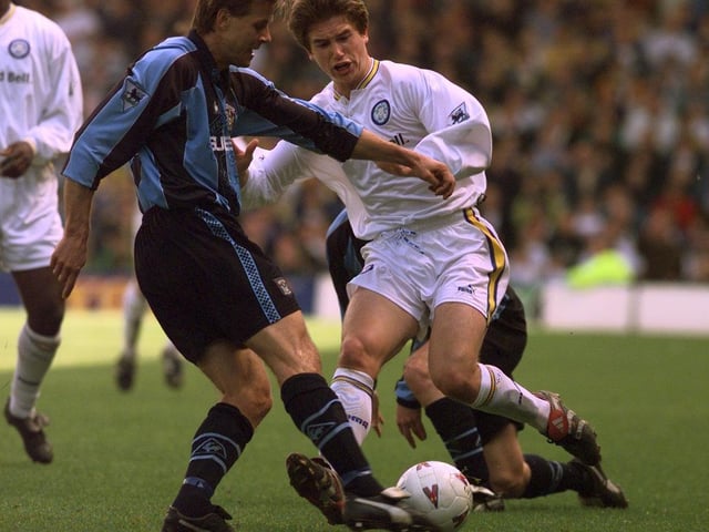 Harry Kewell closes down Coventry City's Roland Nilsson.
