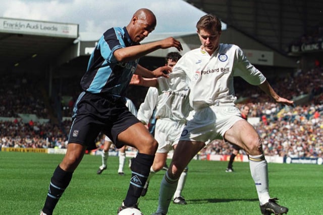 David Wetherall closes down Coventry City striker Dion Dublin.