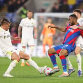 Kalvin Phillips tackles Crystal Palace's Jordan Ayew during Monday night's goalless draw at Selhurst Park. Picture: Warren Little/Getty Images.