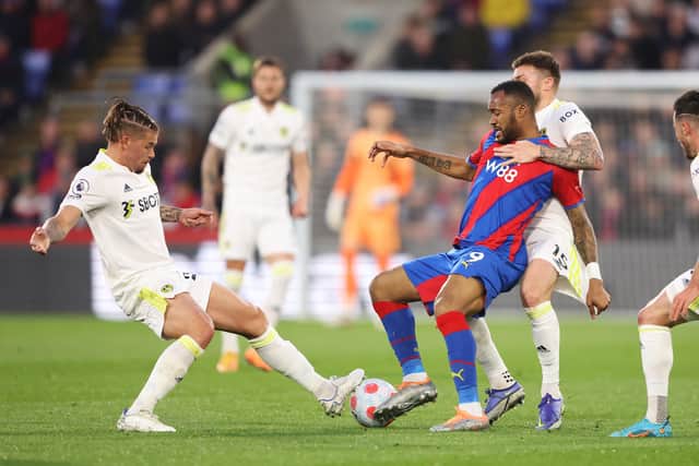 Kalvin Phillips tackles Crystal Palace's Jordan Ayew during Monday night's goalless draw at Selhurst Park. Picture: Warren Little/Getty Images.