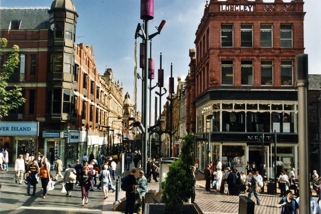 The corner of Lands Lane and Albion Place looking towards Briggate in September 1999. Shops visible include River Island and Next.