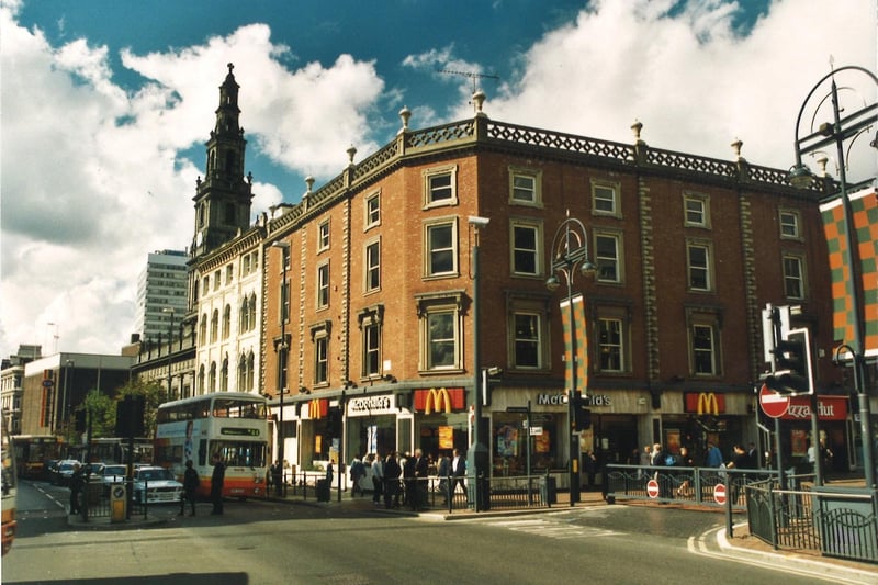 The junction of Boar Lane and Briggate looking from Duncan Street. McDonalds fast food restaurant can be seen on corner with Pizza Hut restaurant next door on the right.